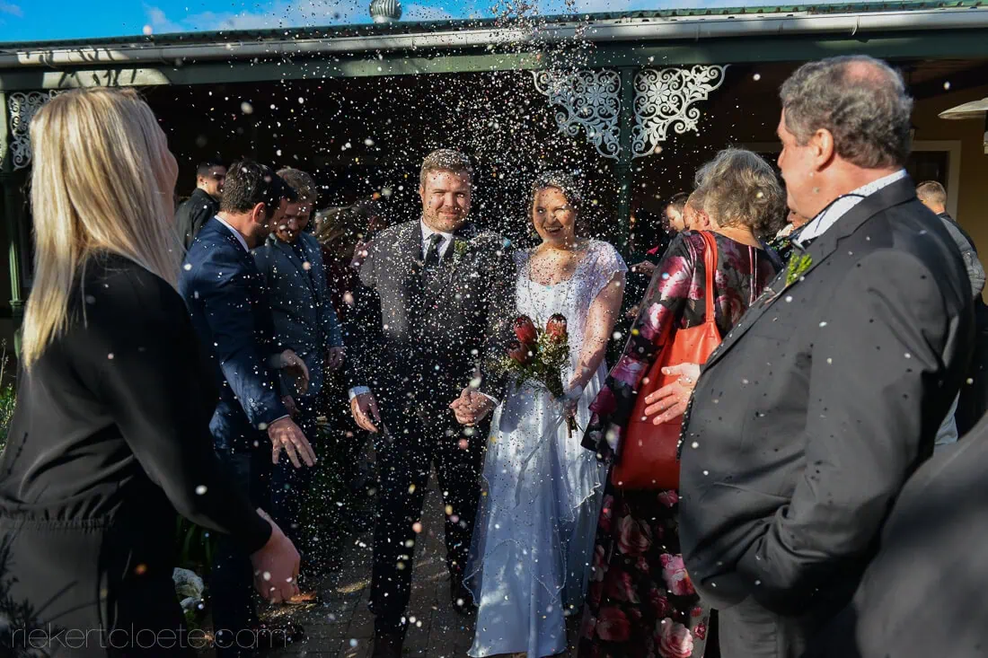 Skilpad vlei confetti shower decorative iron gate venue – Skilpadvlei Wine Estate, Stellenbosch