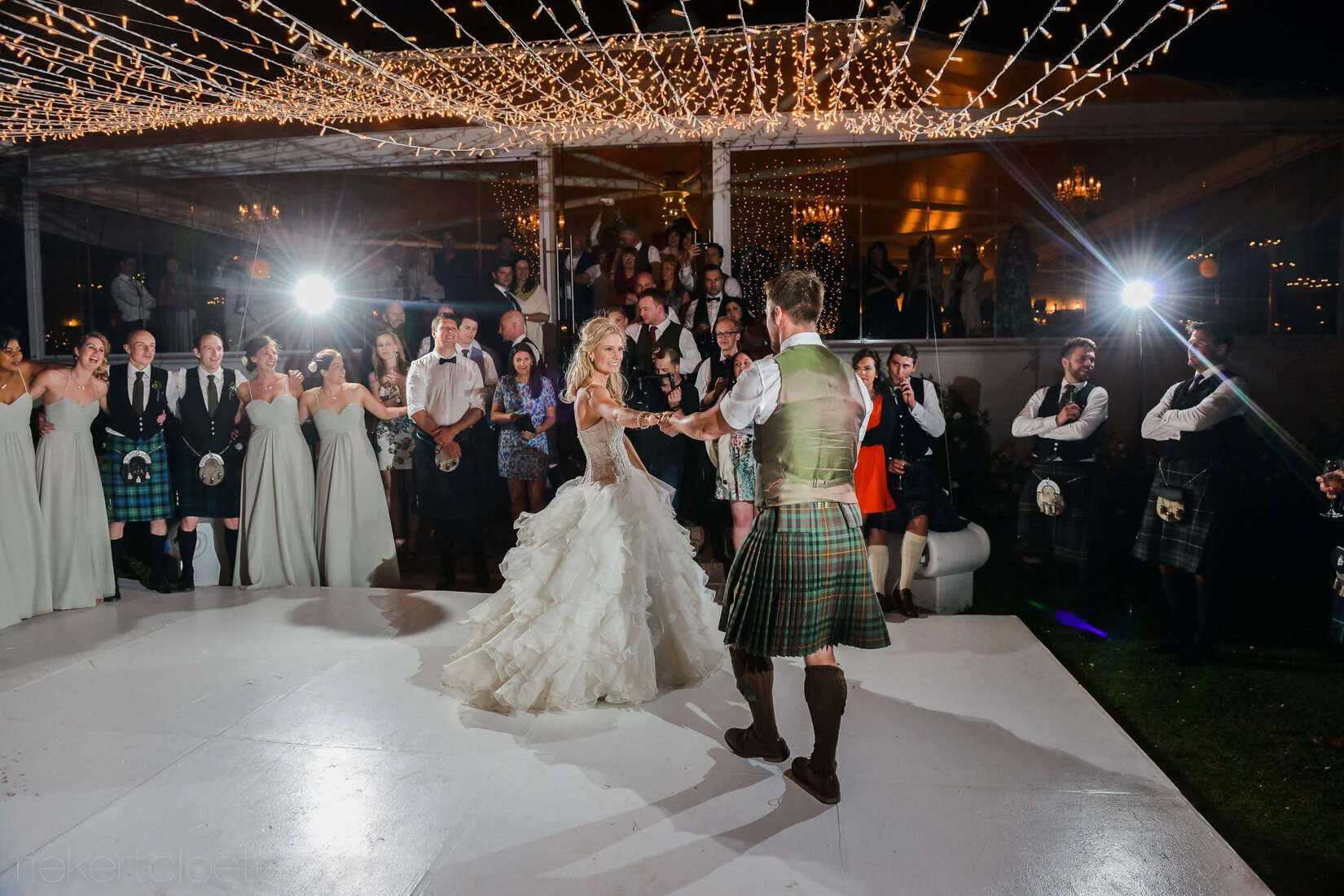 Couple first dance groom kilt outdoor fairy lights – Vrede en Lust Wine Estate, Franschhoek