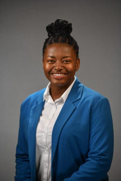 commercial headshot photos of girl in blue jacket